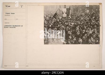 This photograph captures a liberation celebration in Alsace Lorraine during World War One. The event is depicted symbolically and was carried out by the 50,096 Signal Corps photographer. The photograph was taken to commemorate the liberation of Alsace Lorraine. Stock Photo