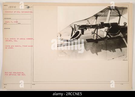 The image shows a Lewis gun camera that is fixed mounted on a plane at the U.S. School of Aerial Gunnery in Oneanta, California. The photo was taken on September 5, 1918 and was designated as subject number 18510. This photograph was for official use only and not meant for publication. Stock Photo