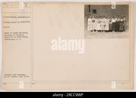 'Group of women employees from the Division of Pictures, Committee on Publication in Washington, D.C. seen in this photograph taken on July 10, 1918. The image is censored, released, and bears an identification number of 111-SC-14300. Published notes include 9014300 and 89099.614.' Stock Photo