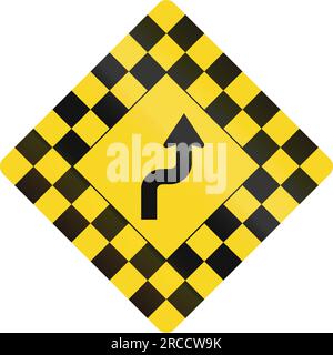 Checked warning road sign in Canada with reverse curve. This sign is used in Ontario. Stock Photo