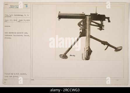 Private L.P. Goldshlag from the Signal Corps is pictured holding a Browning machine gun from the Ordnance Department. The photograph was taken in Tours, France on July 31, 1918. It was received on December 13, 1918, and is stamped with the approval of the A.E.P. censor. Stock Photo