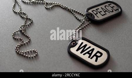 Military ID tags on dark background Stock Photo