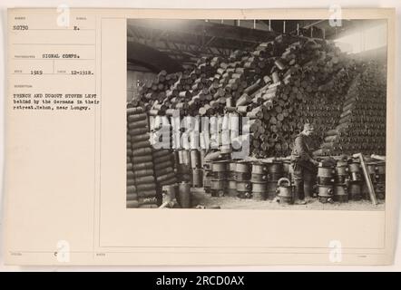 This photograph shows trench and dugout stoves left behind by German soldiers during their retreat in Rehon, near Longwy. The photo was taken in December 1918, and it is cataloged as number 50730. The photographer, Signal CDRPS, captured this image for documentation purposes. Stock Photo