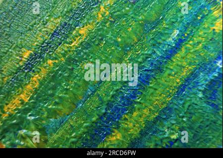 The background with diagonal stripes is made from different colors. Abstract background wet paint. Stock Photo