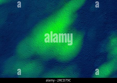 Blue and green pattern on plastered wall in closeup Stock Photo
