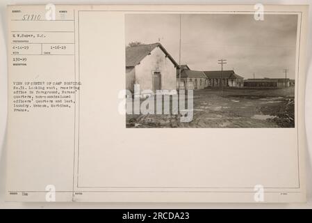 A view of the center of Camp Hospital No. 31 in Menecon, Morbihan, France. The photograph shows the receiving office in the foreground, followed by the Nurses' quarters, non-commissioned officers' quarters, and the laundry building. The image was taken on April 14, 1919, by photographer WW. Soper. Stock Photo