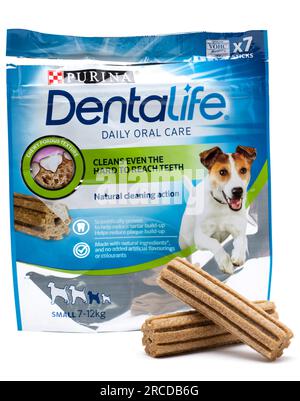 Opened Packet of Seven Purina Dentalife Daily Oral Dental Care Chews for Small 7 to 12 Kilogram Dogs Stock Photo