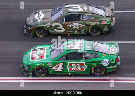 ATLANTA, GA - JULY 09: Kevin Harvick (#4 Stewart Haas Racing Hunt Brothers  Pizza Ford) and Austin Dillon (#3 Richard Childress Racing Dow Salutes  Veterans Chevrolet) race side by side during the