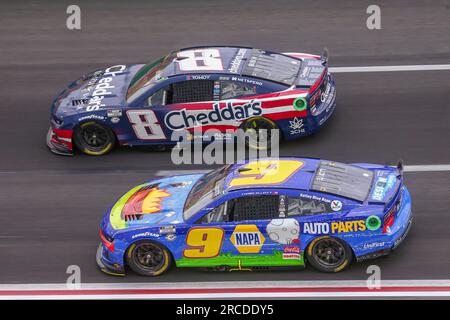 ATLANTA, GA - JULY 09: Kevin Harvick (#4 Stewart Haas Racing Hunt Brothers  Pizza Ford) and Austin Dillon (#3 Richard Childress Racing Dow Salutes  Veterans Chevrolet) race side by side during the