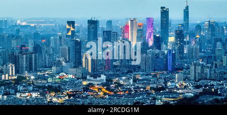 (230714) -- NANJING, July 14, 2023 (Xinhua) -- This aerial photo taken on June 11, 2023 shows the Fuzi (Confucius) Temple scenic area and the city view in Nanjing, east China's Jiangsu Province. The ancient city Nanjing, with a history of around 2,500 years, has started many renewal projects along the Qinhuai River in recent years. This has helped bring the old and new together to create a brighter future of the city. Such urban renewal projects have also led to the prosperity of the cultural sector in the ancient city. In 2022, the added value of Nanjing's cultural industry reached 112 billio Stock Photo