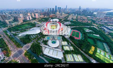 (230714) -- NANJING, July 14, 2023 (Xinhua) -- This aerial photo taken on June 13, 2023 shows the Nanjing Olympic Center in Nanjing, east China's Jiangsu Province. The ancient city Nanjing, with a history of around 2,500 years, has started many renewal projects along the Qinhuai River in recent years. This has helped bring the old and new together to create a brighter future of the city. Such urban renewal projects have also led to the prosperity of the cultural sector in the ancient city. In 2022, the added value of Nanjing's cultural industry reached 112 billion yuan (about 15.6 billion U.S. Stock Photo