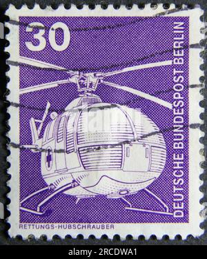 ISTANBUL, TURKEY - JANUARY 25, 2021: German stamp shows Rescue helicopter circa 1975 Stock Photo