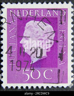 ISTANBUL, TURKEY - JANUARY 25, 2021: Netherlands stamp shows Queen Juliana circa 1974 Stock Photo