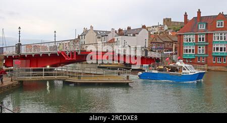 Whitby Swing Bridge at Bridge St, Whitby swung for Wild Cat WY833 vessel, North Yorkshire, England, UK,YO22 4BG Stock Photo