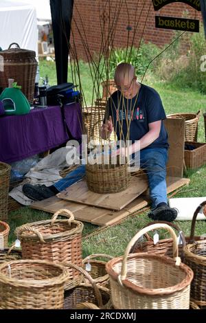 basket maker making woven baske Stock Photo