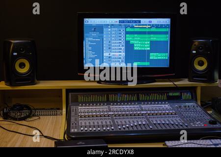 Musical sound instruments equipment production Hands fingers on the work computer, laptop, mouse, control pad, details keyboard typing product student Stock Photo