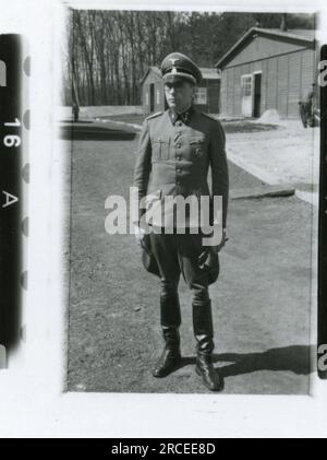 SS Photographer Feder 1943 & 1944 Remains of crashed aircraft, many individual soldier, officer, women personnel portrait, Belgian soldiers, Rexist , detailed photos of a resupply bomb, rocket launcher frame, barrack scenes, rifle and pistol marksmanship practice, families with children Images depicting the front-line activities of Waffen-SS units on the Western and Eastern Fronts, including Poland, France, Balkans, Italy, and Russia, as well as training exercises, portraits of individuals and group views, and scenes of cities and towns, and local populations. Stock Photo