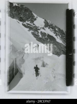 SS Photographer, Fink ,1943 & 1944 Funeral procession, Reinhard Heydrich, artist sculpting bust of Heydrich,  Heinrich Himmler, soldiers training with rocket launcher, ski troops training in mountains, bridging operation in mountains. Images depicting the front-line activities of Waffen-SS units on the Western and Eastern Fronts, including Poland, France, Balkans, Italy, and Russia, as well as training exercises, portraits of individuals and group views, and scenes of cities and towns, and local populations. Stock Photo