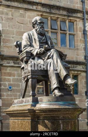 Statue of Charles Darwin outside the Shrewsbury Library, Shrewsbury, Shropshire, UK Stock Photo