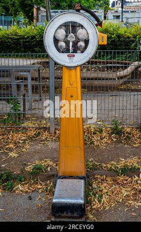 Vienna, Austria, 08.07.2023, Vintage coin operated weight scale in the street Stock Photo