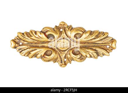 Daugavpils, Latvia July 11, 2023.Decorative bronze ornaments for furniture in retro style on a white background. Stock Photo