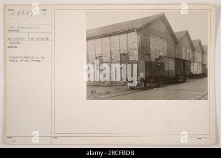 Factual caption: 'Forage warehouse at St. Denis, Seine, France. This photograph was taken by Sergeant Corno Chan, S.C., on December 26, 1918. It is numbered as 2896-N9 and was part of the RECO collection on March 1, 1919.' Stock Photo