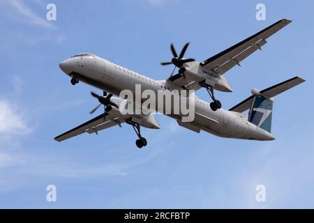 Westjet DHC-8 landing at Vancouver Stock Photo