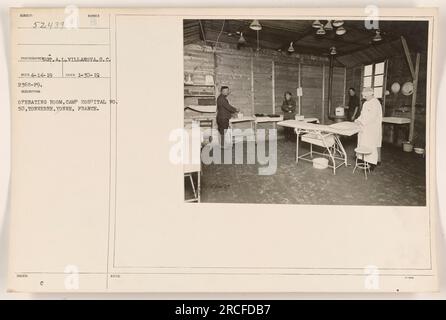 A photograph of an operating room at Camp Hospital No. 50 in Tonnerre, Yonne, France during World War One. The image was captured by Sgt. A. L. Villanova, S.C. The photo was taken on January 30, 1919, and has the reference numbers 2368-19 and 52439. Stock Photo