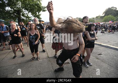 Vizovice, Czech Republic. 14th July, 2023. Visitors during the second day of the Masters of Rock international metal music festival in Vizovice, Czech Republic, July 14, 2023. Credit: Dalibor Gluck/CTK Photo/Alamy Live News Stock Photo