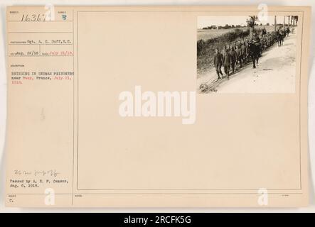 Soldiers bringing in German prisoners near Vaux, France on July 21, 1918. This photograph was taken by Sgt. A.C. Duff and was issued on August 6, 1918. It is part of a collection titled 'Photographs of American Military Activities during World War One.' Stock Photo