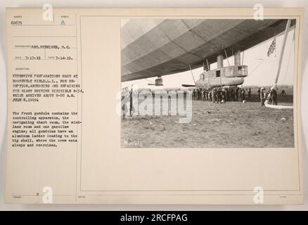 Preparations underway at Roosevelt Field, L.I., for the arrival and maintenance of the British dirigible R-34 in July 1919. The photograph, taken on July 14, 1919, shows the front gondola of the dirigible, which houses the controlling apparatus, navigation chart room, windlass room, and one gasoline engine. All gondolas have an aluminum ladder leading to the crew's accommodation in the main shell. Photo number: 60675. Taken by Sgt. Steniger, S.C. Received on July 17, 1919. Stock Photo