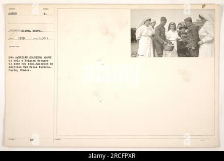 American soldiers and American Red Cross workers assisting a Belgian Refugee in Paris, France. The soldiers are helping the refugee to some hot soup. The photograph was taken in 1919 and is cataloged as number 20600 by the Signal Corps. Stock Photo