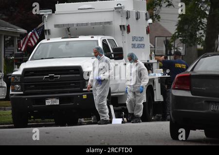 United States. 14th July, 2023. Numerous investigators at the crime scene. Crime scene investigators on scene as a suspect is arrested in Gilgo Beach serial killings In Massapequa Park, Long Island, New York on July 14, 2023. Massive police presence on First Avenue and Michigan Avenue as police apprehend the suspect involved in the Gilgo Beach serial killings. Credit: SOPA Images Limited/Alamy Live News Stock Photo