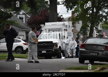 United States. 14th July, 2023. Numerous investigators at the crime scene. Crime scene investigators on scene as a suspect is arrested in Gilgo Beach serial killings In Massapequa Park, Long Island, New York on July 14, 2023. Massive police presence on First Avenue and Michigan Avenue as police apprehend the suspect involved in the Gilgo Beach serial killings. Credit: SOPA Images Limited/Alamy Live News Stock Photo