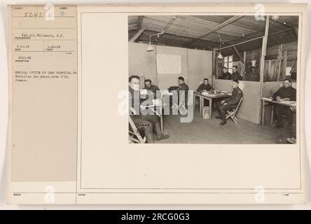 Caption: General office of Camp Hospital 64, located in Chatillon sur Seine, Cote d'Or, France. This photograph, taken by Sgt. A.L. Villanova on April 14, 1919, shows the interior of the office. The image is part of a collection of photographs capturing American military activities during World War One. Stock Photo