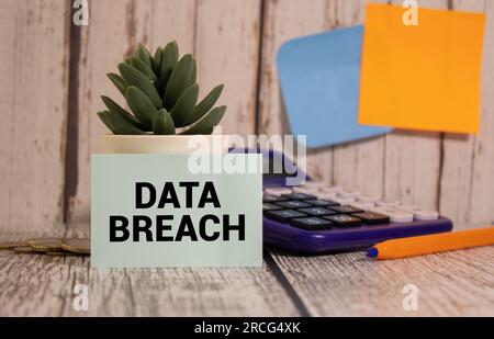 Word text DATA BREACH on white paper card, business concept Stock Photo