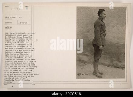 Battalion Sergeant Major John J. Chisholm, a 23-year-old soldier from Hqrs. Det., Hqrs. Troop, 32nd Division, is photographed wearing a clerical uniform. He was born in Rice Lake, Wisconsin, with a Chippewa Indian father and a Chippewa Indian and French mother. Chisholm is a railroad clerk and stenographer and enlisted in the Machine Gun Co., 3rd Wisconsin Infantry. He has received a promotion to Battalion Sergeant Major based on his exceptional skills as an expert stenographer and his ability to efficiently manage office records. Stock Photo