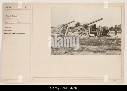 A photograph showing various types of heavy artillery used during World War One. This picture is part of a collection of 50,452 images taken by the Signal Corps. The photographer's description mentions that the artillery takes 18Sued Synsol B Ordnance. There are also notes on the image, noted as 52 1-0006. Stock Photo
