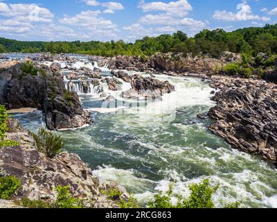Majestic Great Falls roars and cascades in a breathtaking display of natural beauty. Located in Virginia, USA, it captivates with its awe-inspiring gr Stock Photo