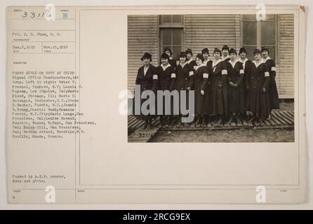 Pvt. T. R. Shaw took this photograph on November 15, 1918, displaying phone girls on duty at the Chief Signal Office Headquarters of the 1st Army. The girls in the image, from left to right, are Ester V. Fresnel, Leonie C. Peyron, Marie Flood, Marie D. Belanger, Grace D. Banker, Jennie R. Young, Suzanne Prevot, Marie Lange, Louise Beraud, B. Hunt, Helen Hill, and Bertha Arlaud. The location is Souilly, Meuse, France. The photo was approved by the A.E.F. censor, but the date is unavailable. Stock Photo