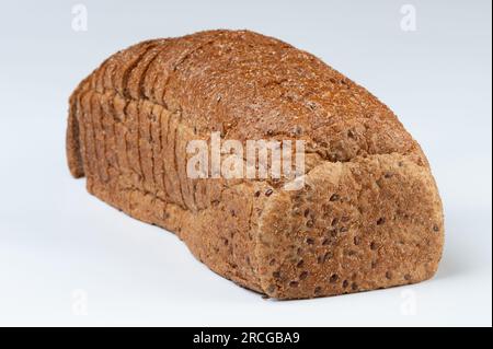 Sliced bread with seed  wholegrain front view isolated on studio background Stock Photo