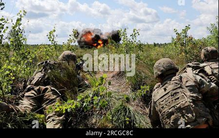 U.S. Army Soldiers with 8th Engineer Battalion, attached to Headquarters and Headquarters Company, 1st Battalion, 9th Cavalry Regiment, 1st Cavalry Division, supporting 4th Infantry Division, conduct a live-demolition exercise at Bemowo Piskie Training Area, Poland, July 14. The 4th Infantry Division's mission in Europe is to engage in multinational training and exercises across the continent, working alongside NATO allies and regional security partners to provide combat-credible forces to V Corps, America’s forward deployed corps in Europe.(U.S. Army photo by Capt. Daniel Yarnall) Stock Photo