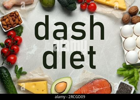 https://l450v.alamy.com/450v/2rcgd09/dietary-approaches-to-stop-hypertension-many-different-healthy-food-around-words-dash-diet-on-white-marble-table-flat-lay-2rcgd09.jpg