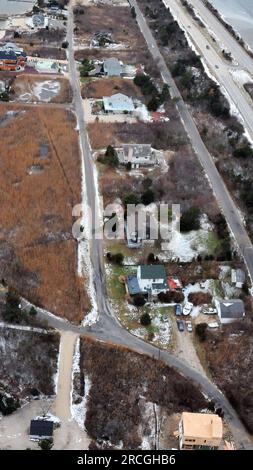 United States Of America. 16th Dec, 2010. NEW YORK - FEBRUARY 09: Joe Brewer's house(FAR LEFT) in the Oak Beach Association was the last place Shannan Gilbert was scene on May. 01, 2010 running screaming 'Help Me' it is believed that she ran to Gustav Coletti's house(FAR RIGHT) then after Coleti called the police she ran into the weeds across from Coleti's house in Oak Beach, NY . People: Serial Killer Suspect Rex Heuermann Credit: Storms Media Group/Alamy Live News Stock Photo