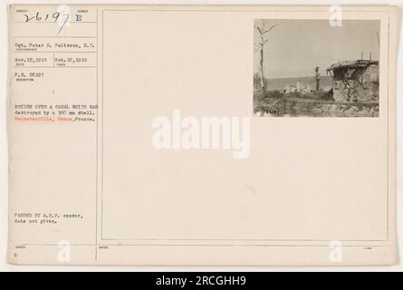 A bridge over a canal in Vacherauville, Meuse, France destroyed by a 380 mm shell during World War One. Photograph taken by Sgt. Peter S. Pelisson on November 12, 1918. Photo issued on October 10, 1918. Censored by the A.E.F. without a provided date. Caption notes reference number - 26197. Stock Photo