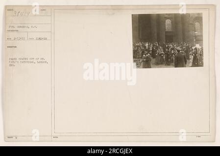 Pvt. Gunshor of the S.C. division documented a scene in London, England on February 13, 1919. The photo shows a large crowd emerging from St. Paul's Cathedral. This image is labeled as 38419 in the collection of American military activities during World War One. Stock Photo