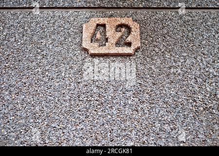 Number 42, forty-two, with ample empty space below. Stock Photo