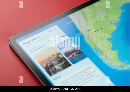 New York, USA - July 6, 2023: Argentina on online apple maps in screen of ipad tablet close up view Stock Photo