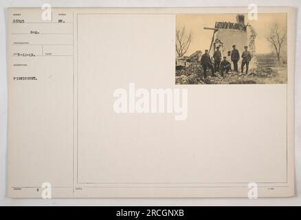 American soldiers in tents at the military camp in Pignicourt during World War One. This photograph was taken by a photographer with the code name SUNDER 66525. The image is labeled as G-2 and was taken for official documentation purposes. The location is Pignicourt and the symbol HU is listed, possibly indicating the unit or division. A note on the back mentions that 3,000 to 4,000 troops were stationed in the camp. Stock Photo