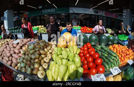 Bucharest, Romania. 14th July, 2023: Romanian farmers listen to the speech of Florin Ionut Barbu (not in picture), Romanian Minister of Agriculture and Rural Development, during the inauguration of the agri-food market "Piata Norilor" by the City Hall of Sector 4, Bucharest. Piața Norilor, the newest and one of the most modern in the Capital, was rebuilt on its old site after the old one-story market was demolished and now has two floors, on the ground floor is a parking lot and on the first floor is the agri-food market addressed to Romanian farmers. Credit: Lucian Alecu/Ģ����ý Live News Stock Photo